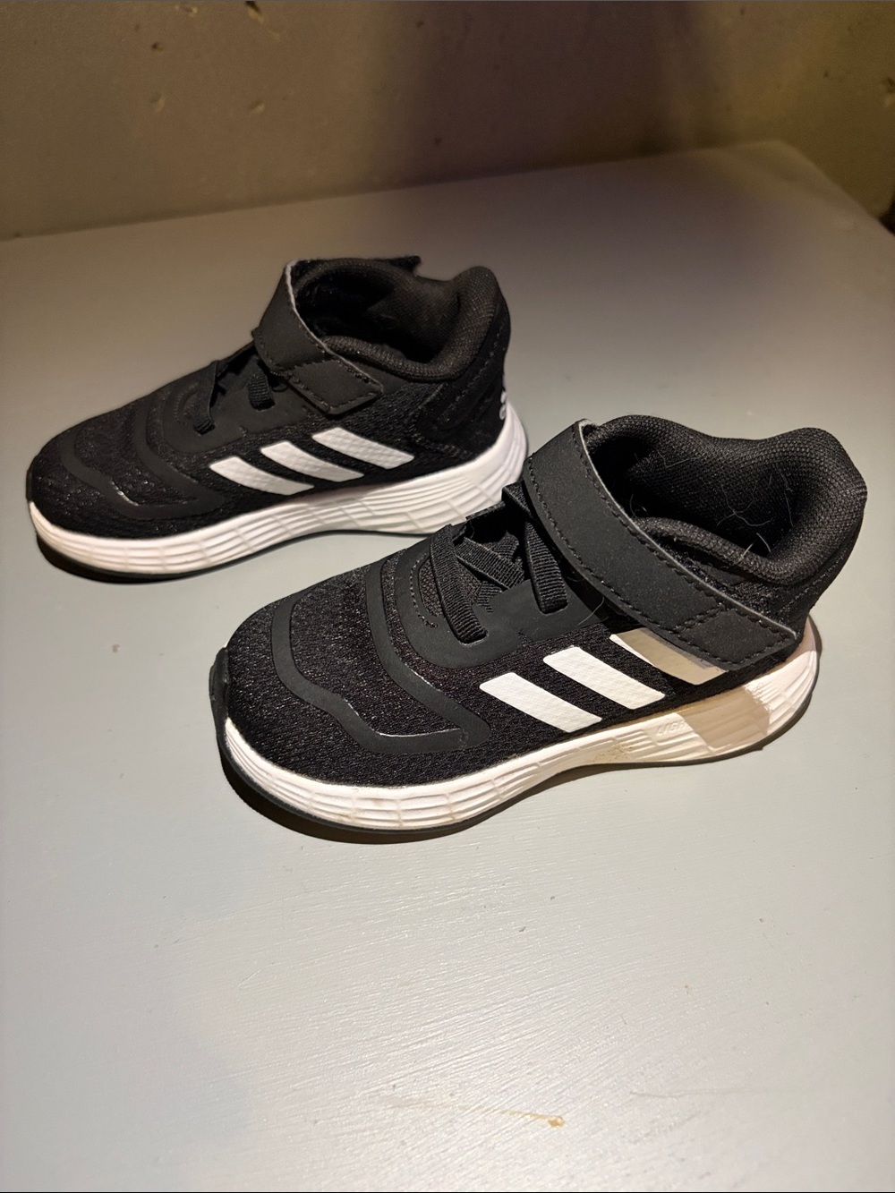Kids Black Athletic Sneakers with White Stripes - Adidas